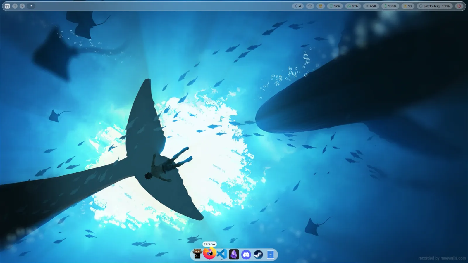 The desktop on a deep blue underwater wallpaper, recoloured to match