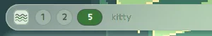 Workspace indicators as chips, the active one stretched wide